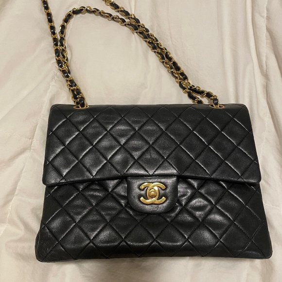 CHANEL Handbags - CHANEL 1990 Vintage Lambskin Quilted Medium Double Flap Black Handbag